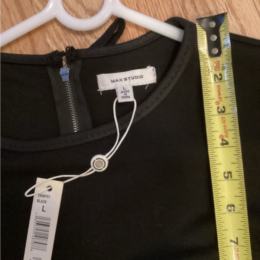 Max Studio Elegant Black Dress size L, soft stretchy, shaped stitching, pockets.